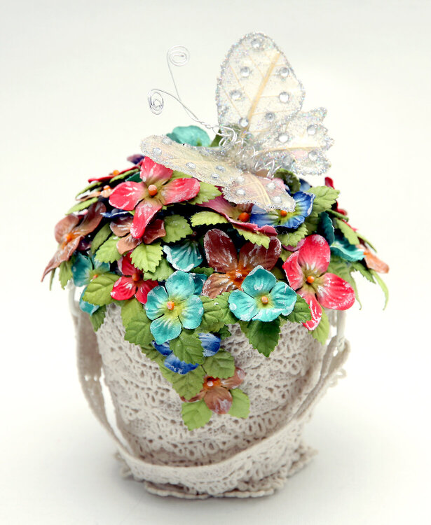 Bucket of Laces with Flowers and a Tag.