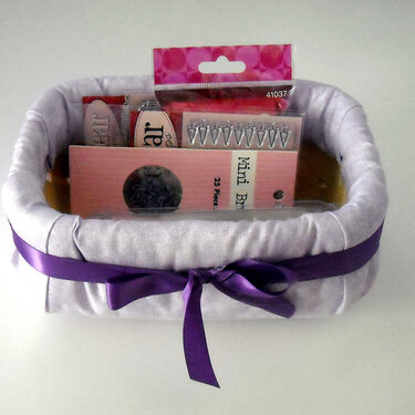 Small fabric covered basket