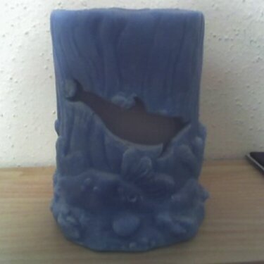Dolphin candle-back