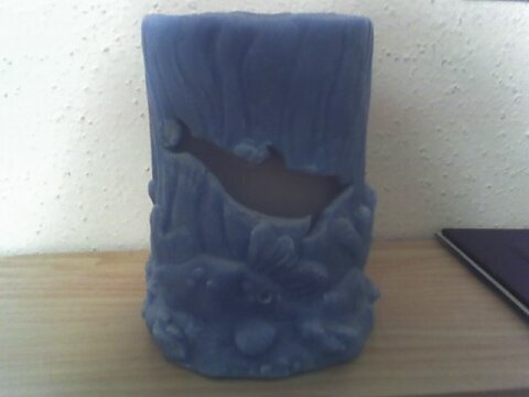 Dolphin candle-back