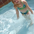 Olivia in the pool in Gulfshores