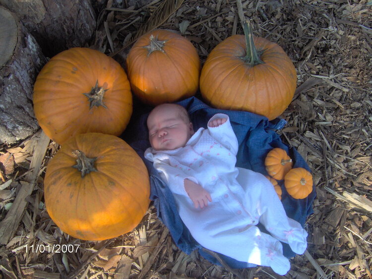 baby Rebekah with the pumpkins