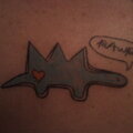 close up of my dino tatoo