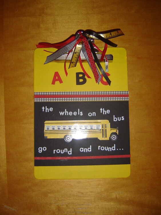 front of preschool teacher clipboard, end-of-year gift