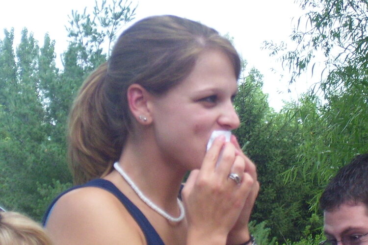 kathey wiping her mouth affter eating