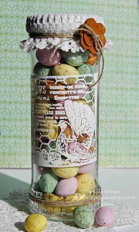 Embosset jar with chocolate eggs