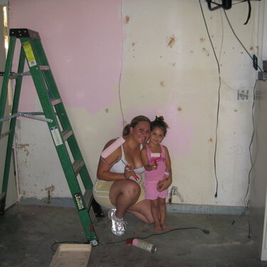 Victoria and I painting the garage wall.