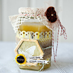 Altered glass jar with honey