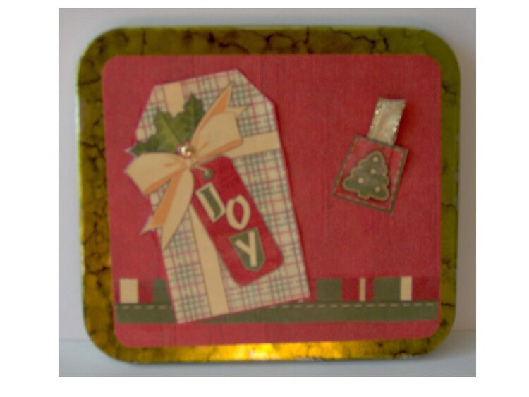 CD tin decorated for Christmas gift giving