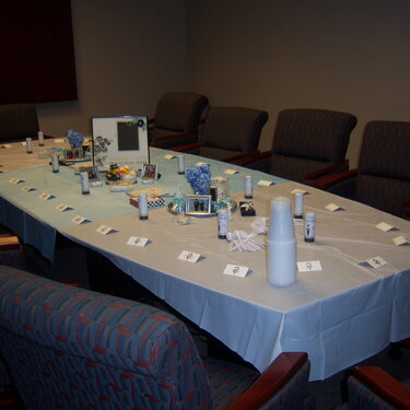 table set up for bridal shower at office conference room