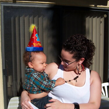 My daughter with her son, my first grandson on his first birthday!
