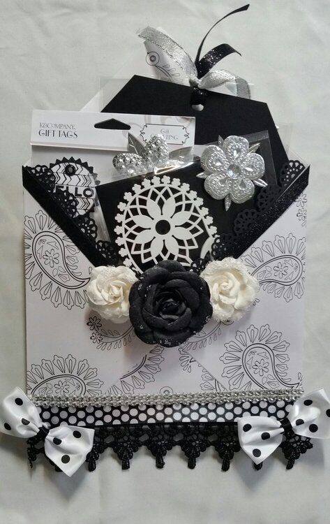 Black and white loaded envelope by Monique Fox