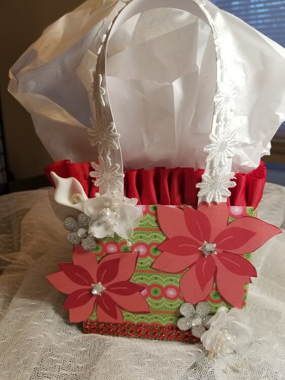 Red, green, and white paper purse for Alana Fox