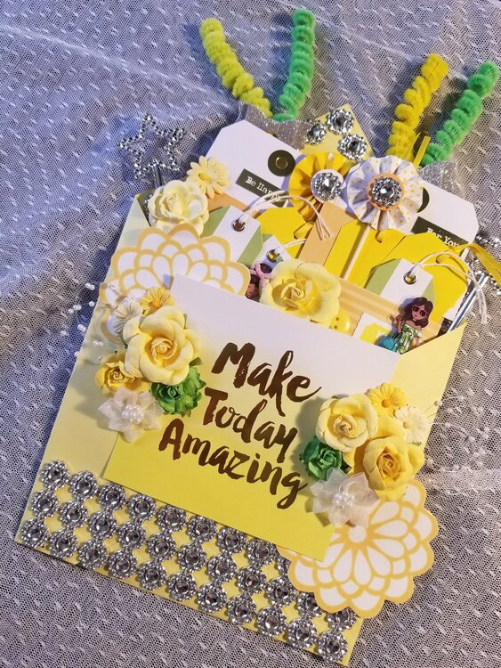 Yellow loaded envelope by Monique Nicole Fox