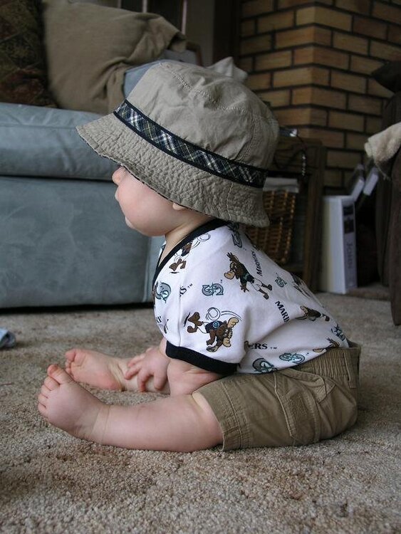 So cute in his sun hat
