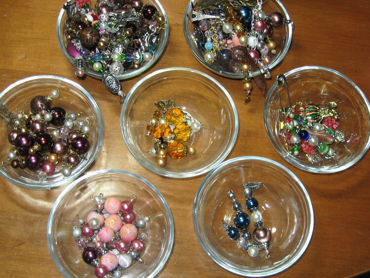 Charm components waiting to be put together