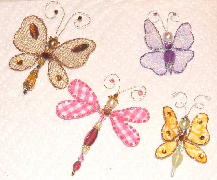 handmade butterflies and a dragonfly