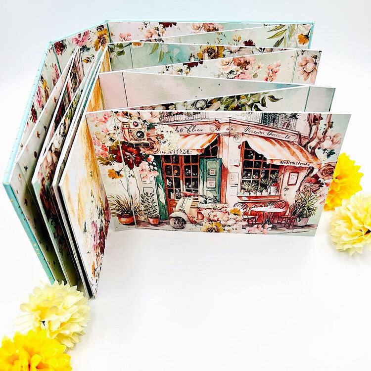 Album in a box with &quot;Places we go&quot; collection by Barbara Paterno