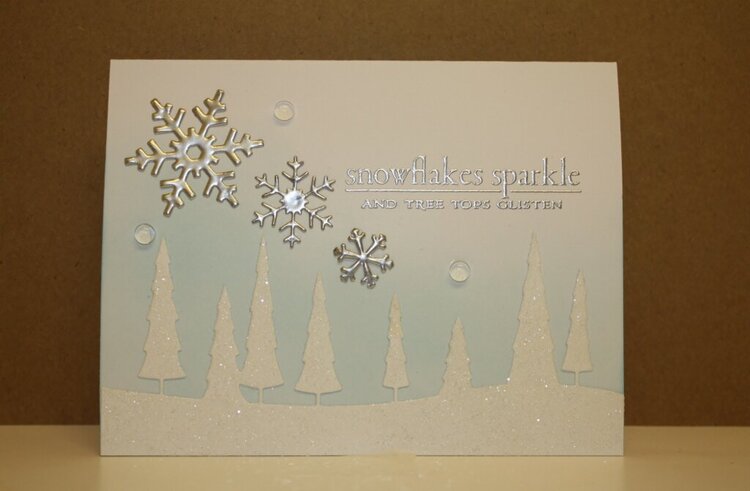 Snowflakes sparkle...