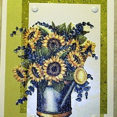 sunflowers in watering can