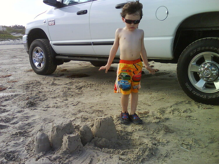 Connor&#039;s first sandcastle