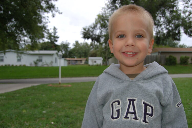 My baby boy in our front yard