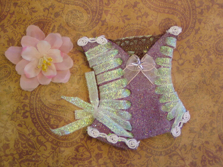 Not a Card yet, but handmaking some Corsets to go on some...