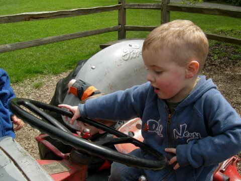 Bryce on the Tractor at the Zoo