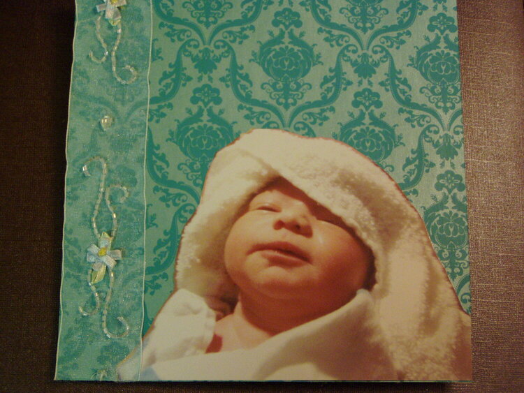 Joseph the night he was Born, with towel wrapped around him after first bath