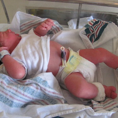 Baby Dylan in the nursery in the hosp. minutes after his birth