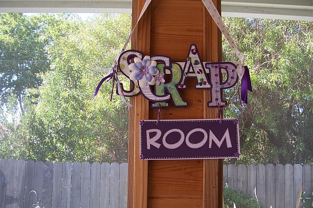 Scrap room sign hanging