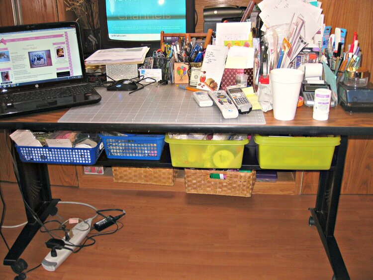 Work Table with shelf of pearls and trim.