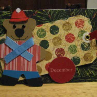 Gingerbread bear dressed for winter.