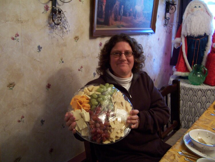 lisa holding the cheese and fruit platter! hugs