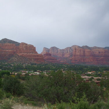 Red rocks with rain clouds