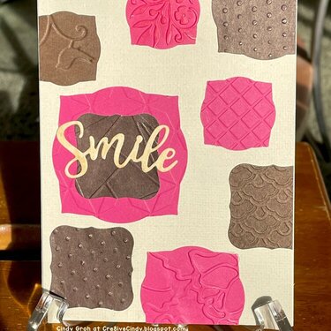 Smile with dry embossed die cuts