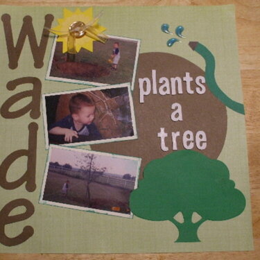 Wade plants a tree