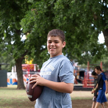 Tyler w/ football