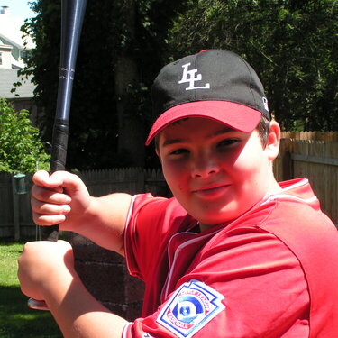 Drew in his baseball uniform