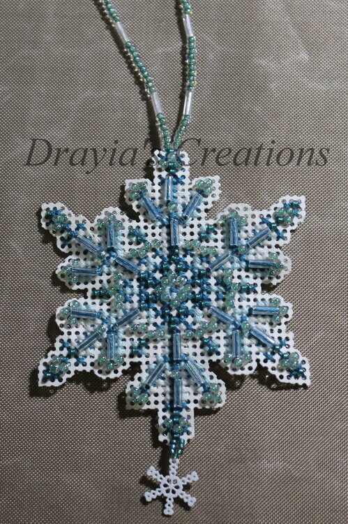 Cross Stitching Snowflakes