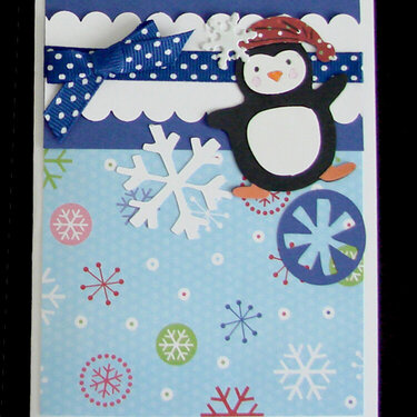 Penguin card with snowflakes in blue