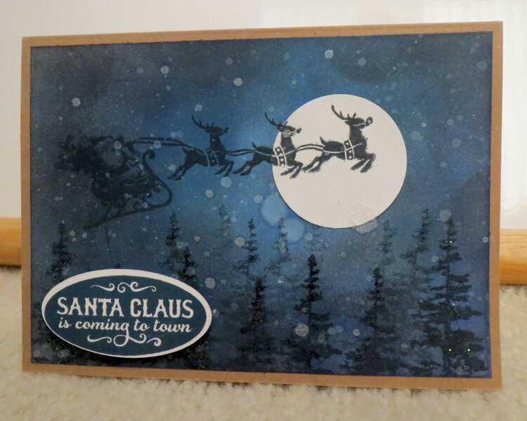 Santa over the moon card