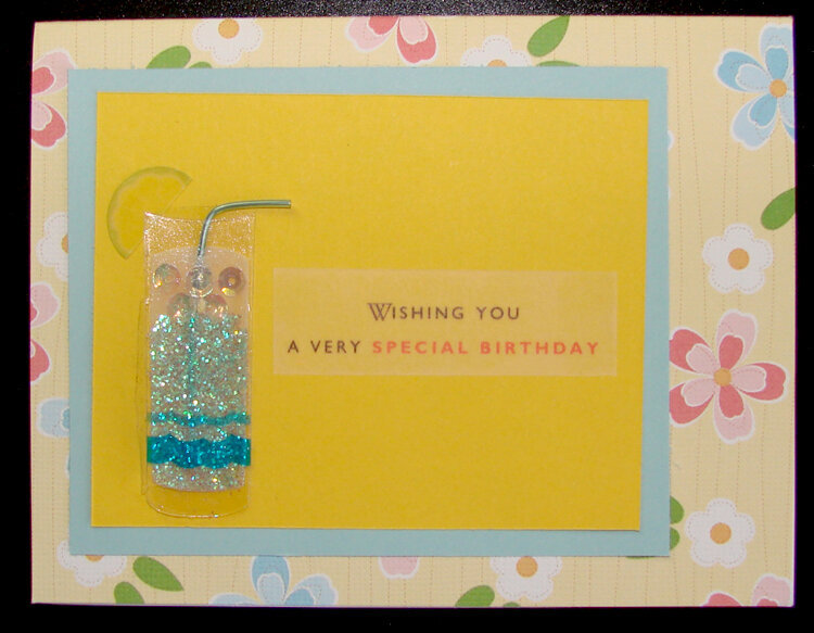 Yellow Birthday card with blue beverage