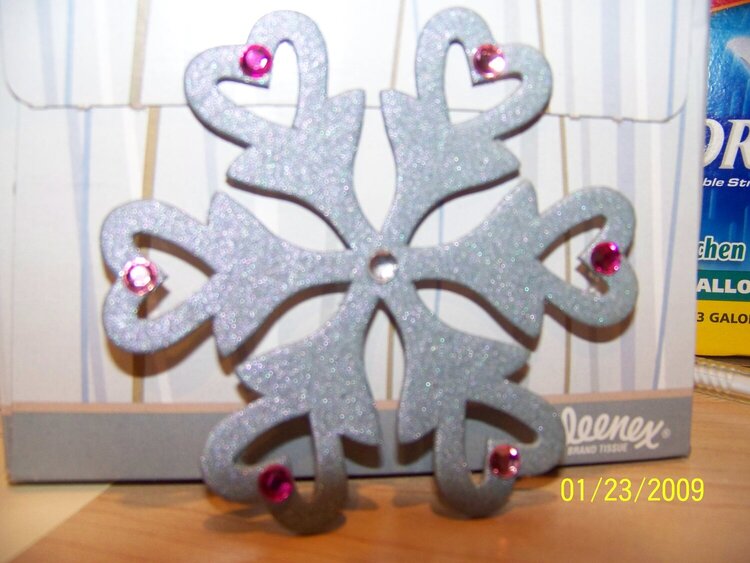 embossed and bedazzled snowflake