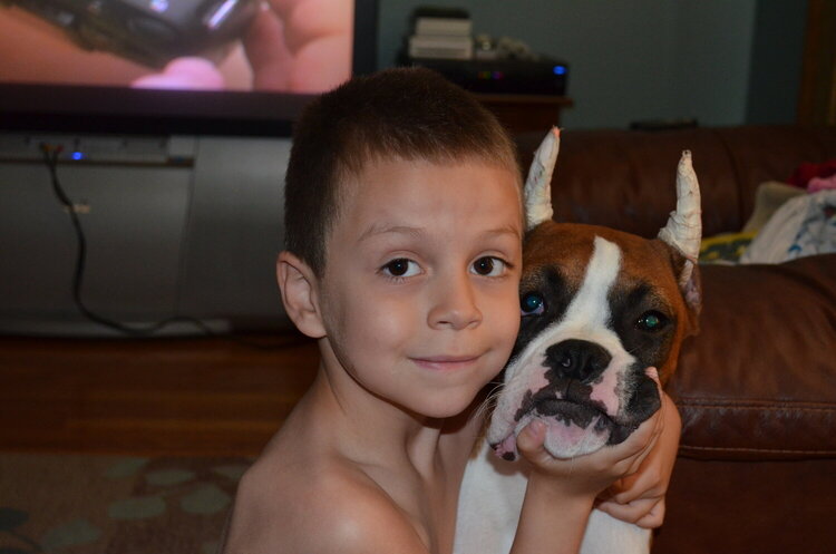 My DS with Mason our new boxer pup.