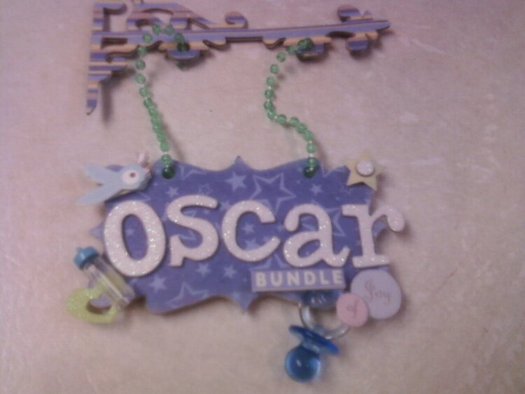 Oscar hanging sign