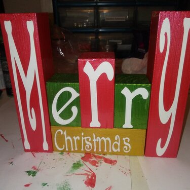 made this yesterday i cut the letters from my cricut the block was cut all ready i painted them and mod podge  them