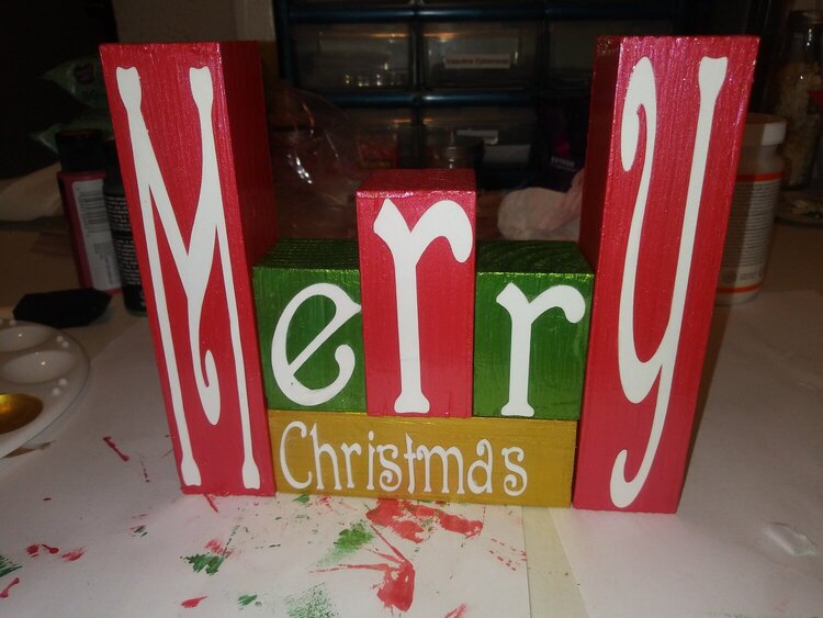 made this yesterday i cut the letters from my cricut the block was cut all ready i painted them and mod podge  them