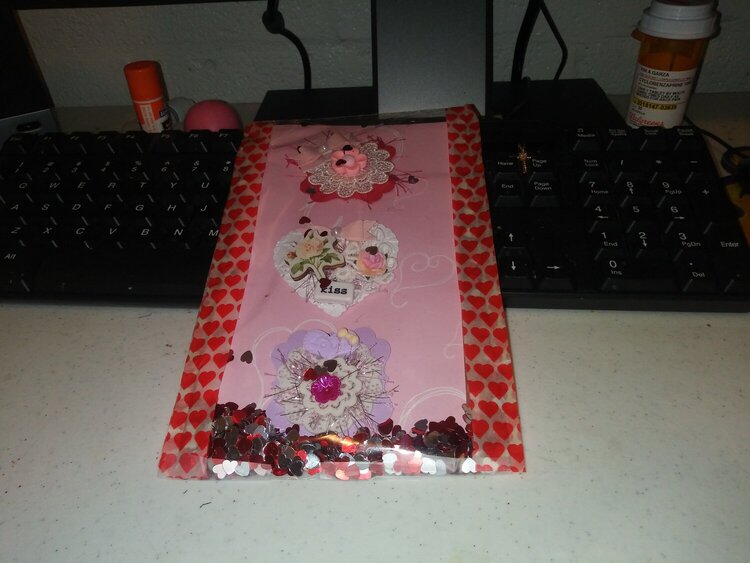 These are embellishments made by a friend of mine Kelly wise it was a valentine&#039;s embellishment swap