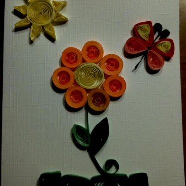 Quilled flower, butterfly and sun